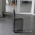 Hollow-out grid umbrella storage rack